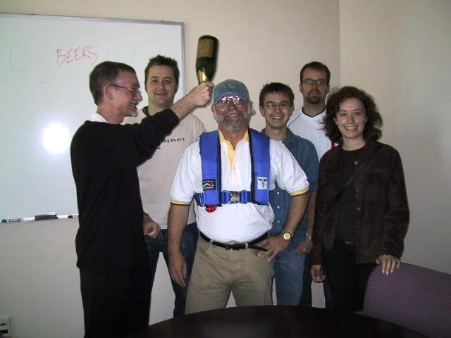 Dave with pressies - Yacht Club hat and shirt plus serious lifejacket.