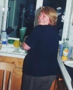 Anne insisted on being photographed while doing some washing-up