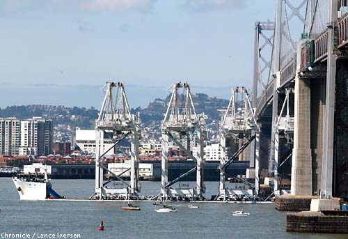 More cranes limbo under the Bay Bridge on the way to Oakland container port
