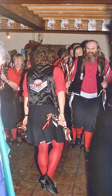 Yet again the rain came, forcing some indoor dancing. Sergeant Musgrave's Dance working within the confines of the Red Lion pool room