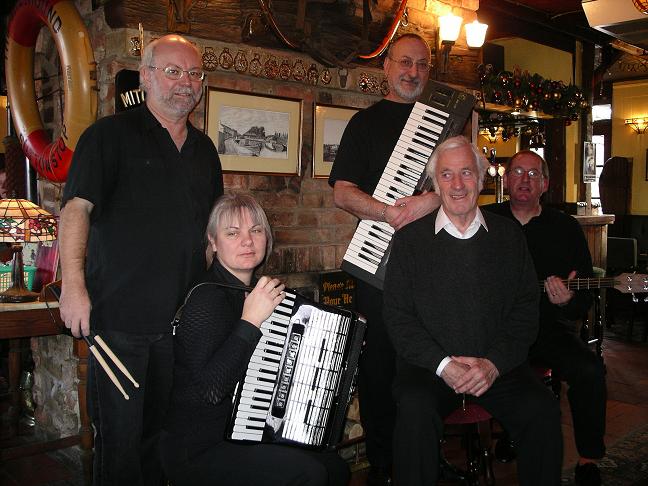 The band with Hugh at the Greyhound Inn, Sutton Stop