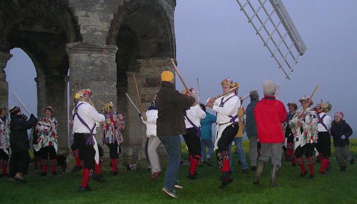 An audience perspiration dance as the sun comes up.