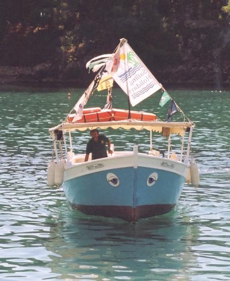 Janni and his water taxi in Parga harbour