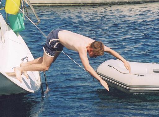 Dan attempts to avoid diving into the dinghy