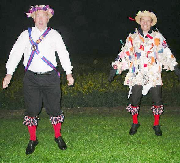 Kerry and Alan warm up before the dancing - 5:00am, May Day at Chesterton Windmill.