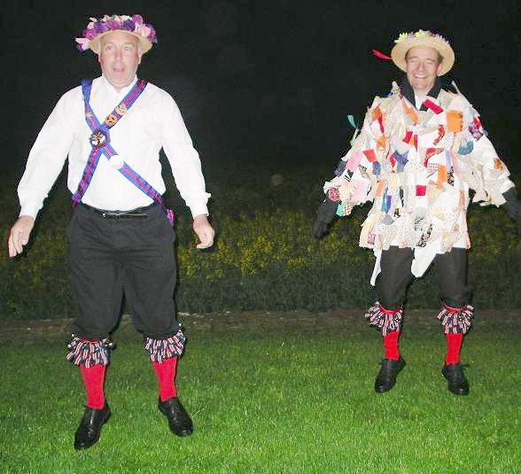 Kerry and Alan warm up before the dancing - 5:00am, May Day at Chesterton Windmill